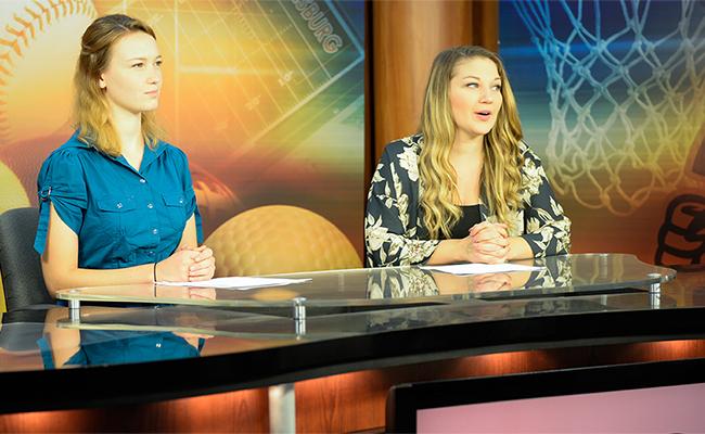 Maura and Holly read the news in our TV studio