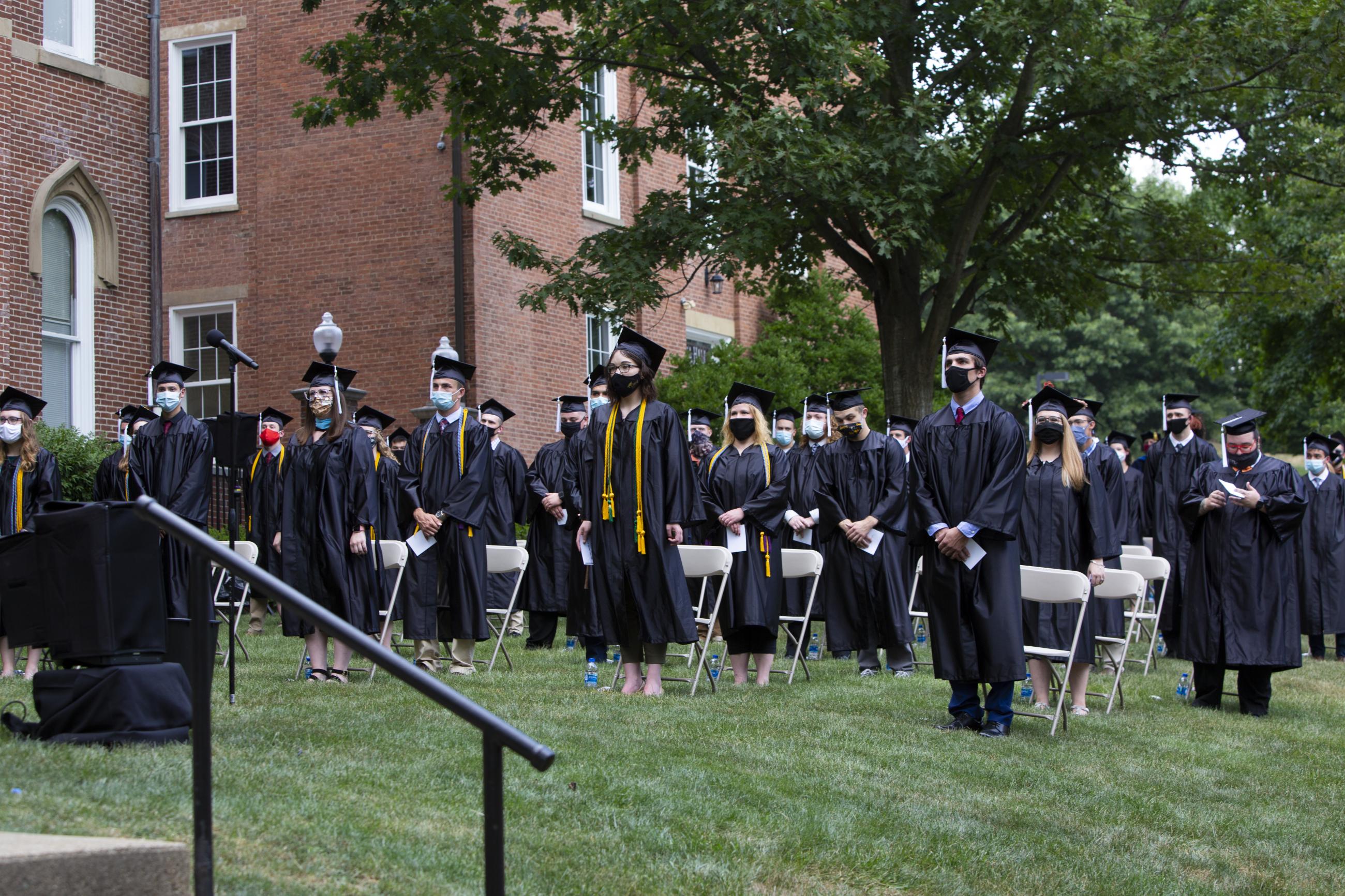 graduates standing