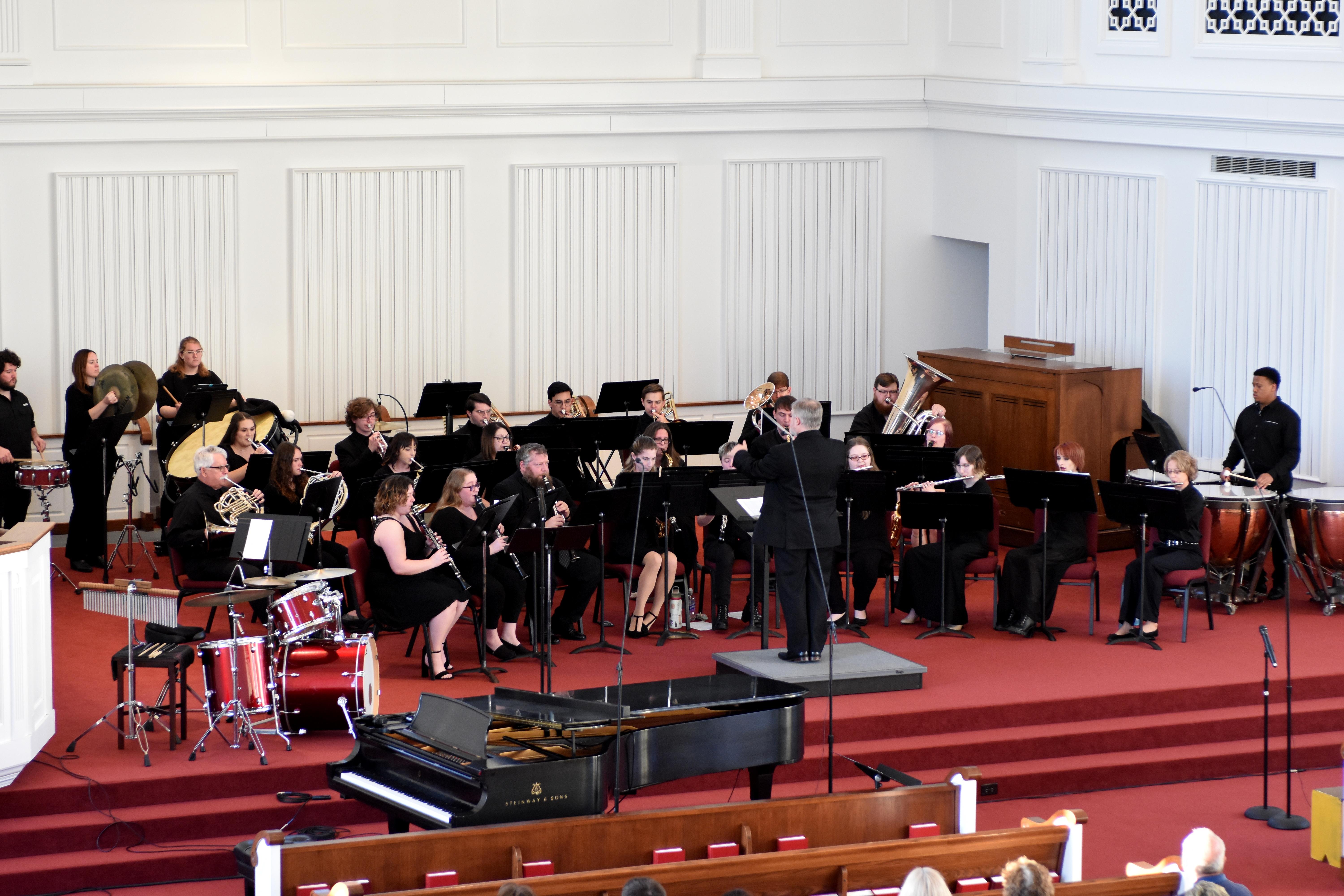 Image of the Symphonic Band performing during the spring 2024 concert.