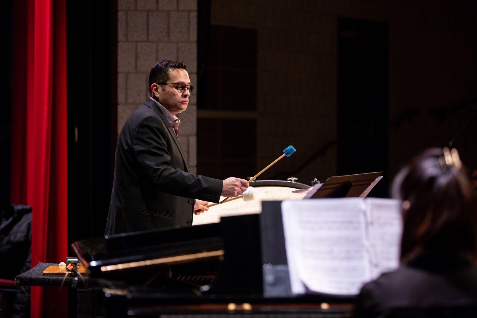 Professor Jauregui Rubio plays the timpani during WU Faculty concert