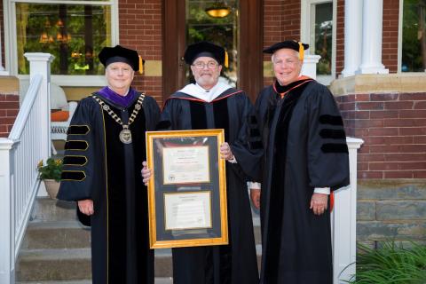 John Montgomery with his honorary doctorate