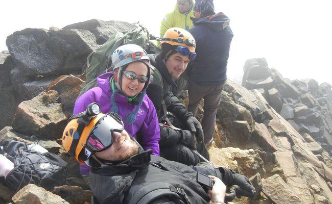 Students taking a break after a tough climb