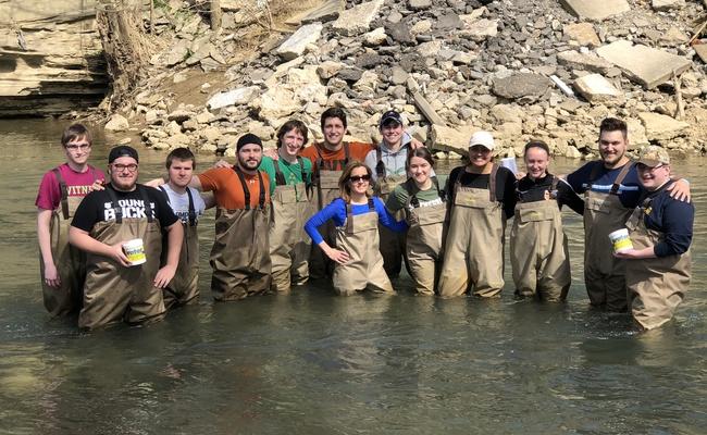 Students posing during their environmental science lab class