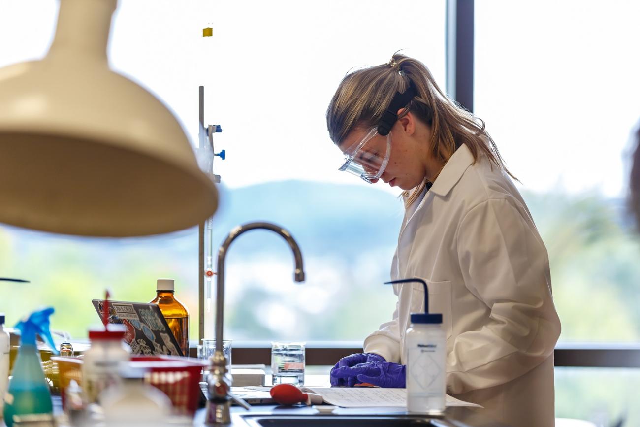 student in a chemistry lab at waynesburg university