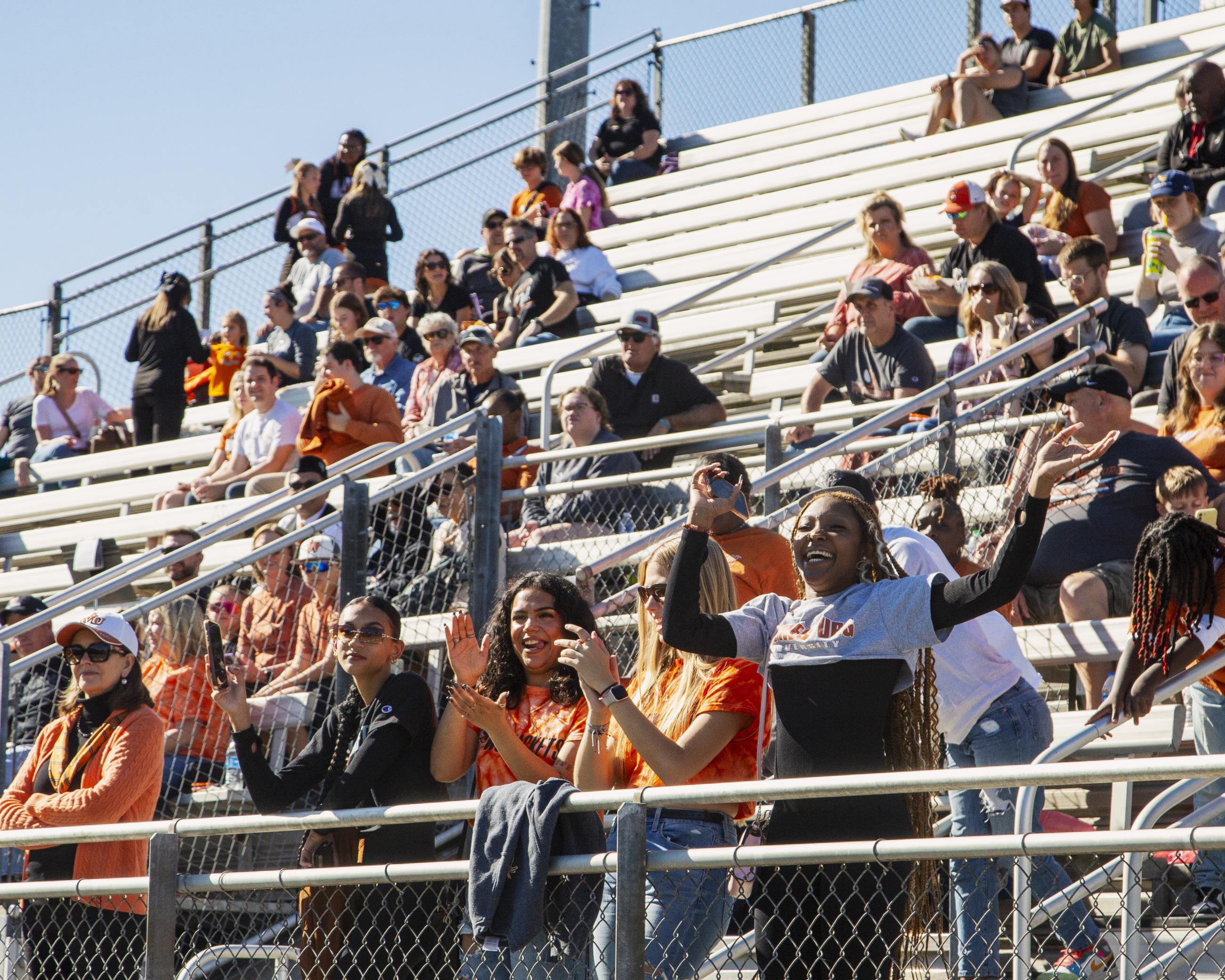 Fans cheer on the Yellow Jackets during the Homecoming football game