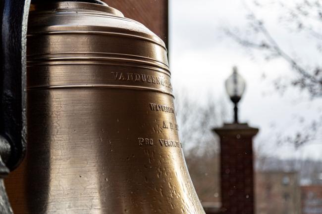 The bell between Hanna Hall and Miller Hall