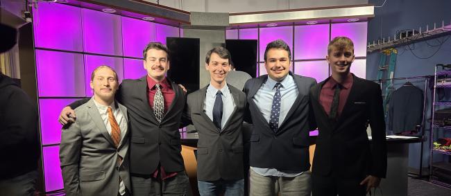 Tim Durkin pictured with other students in the Communication studio