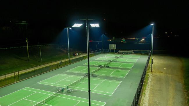 tennis court at night under lights