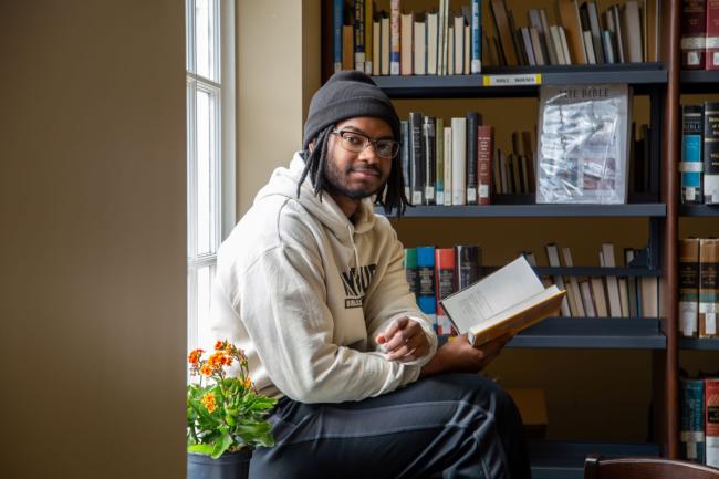 Ross Owens in Eberly Library on campus