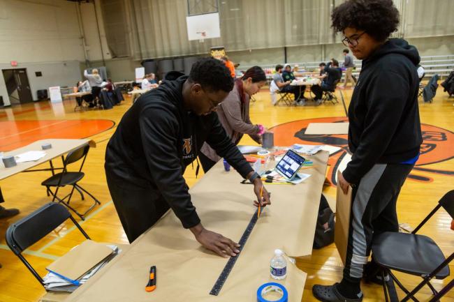 Students work on projects during the Something From Nothing Innovation Challenge